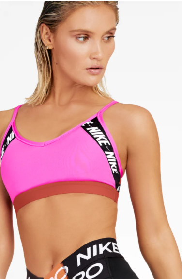 Nike Training Indy NSW Swoosh light support sports bra in pink - ShopStyle